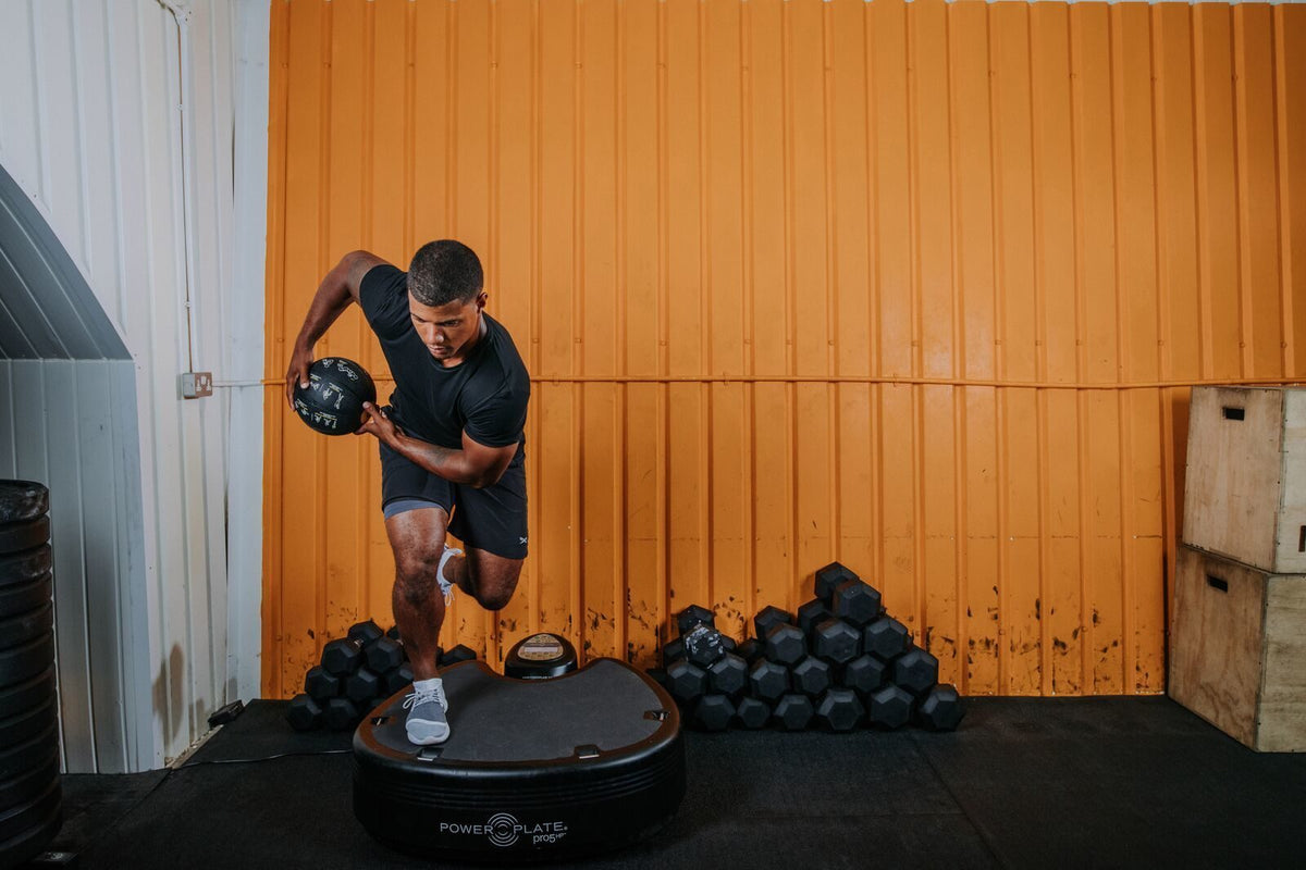 Athlete training on the Power Plate pro5HP in a performance gym