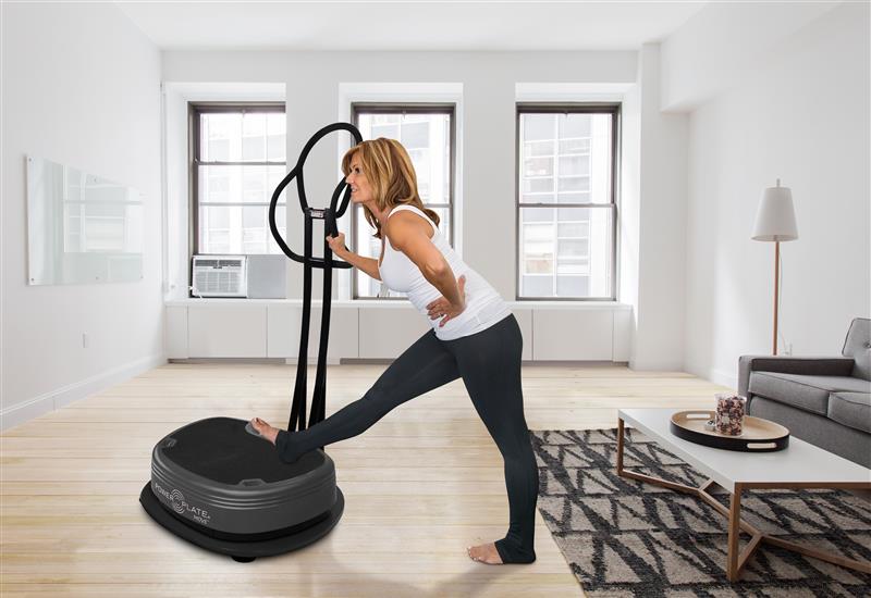 Power Plate MOVE in Titanium shown on the optional MOVE Power Shield (sold separately)