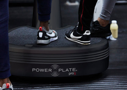 Close-up of feet on the Power Plate pro5 platform