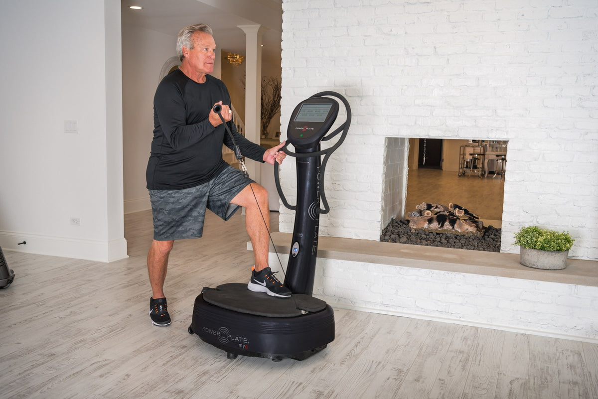 Man using the Power Plate my8 at home