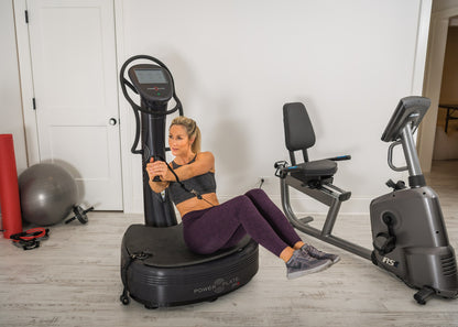 Exercise on the Power Plate pro8 in a gym